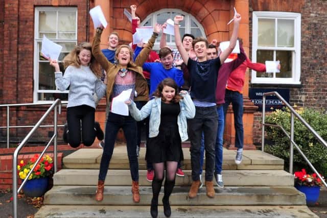 Students at Bootham School in York celebrate their GCSE results. PIC: Tony Johnson