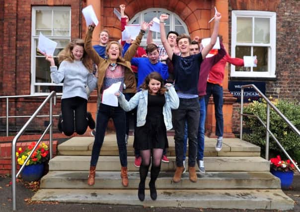 Students at Bootham School in York celebrate their GCSE results. PIC: Tony Johnson