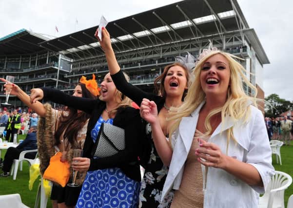 Emma Caine, Stacey Day, Leanne Wood and Sarah Milner cheer Tiggy Wiggy to victory during  Ladies Day at York Ebor Festival. PIC: Tony Johnson