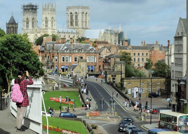 Views of the Minster from Yorks famous city walls are pulling in growing numbers of tourists from Australia, America and China.