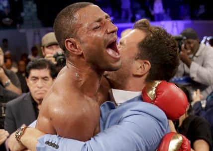 Kell Brook, left, celebrates his win against Shawn Porter during the IBF welterweight title boxing bout Saturday, Aug. 16, 2014, in Carson, Calif. (AP Photo/Chris Carlson)