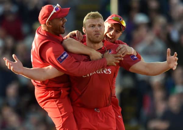 Lancashire Lightning's Andrew Flintoff celebrates with Ashwell Prince (left) and Steven Croft (right) after taking the wicket of Birmingham Bears' Ian Bell with his first ball during the NatWest T20 Blast Final at Edgbaston, Birmingham.
