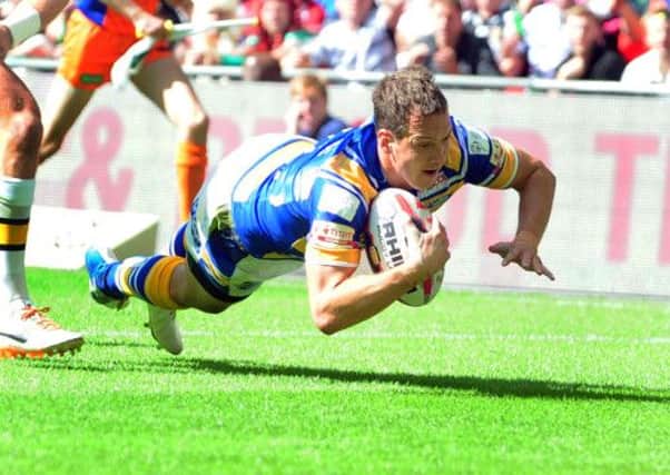 Danny McGuire scores his try for Leeds Rhinos in Saturday's thrilling final. Picture: Steve Riding.