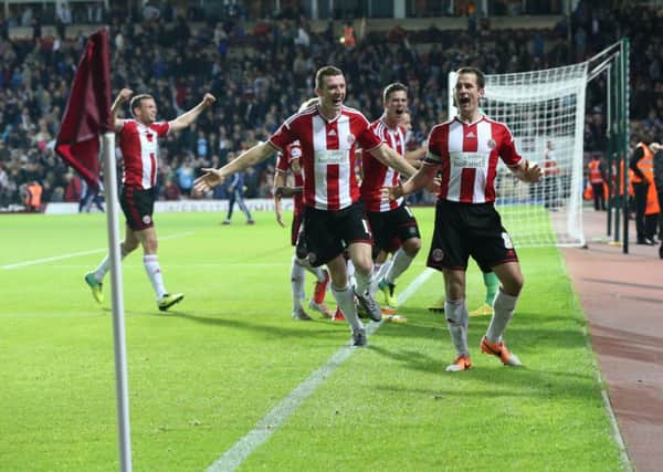 Sheffield United's players celebraste their penalty shoot-out win at West Ham. Picture: Martyn Harrison.
