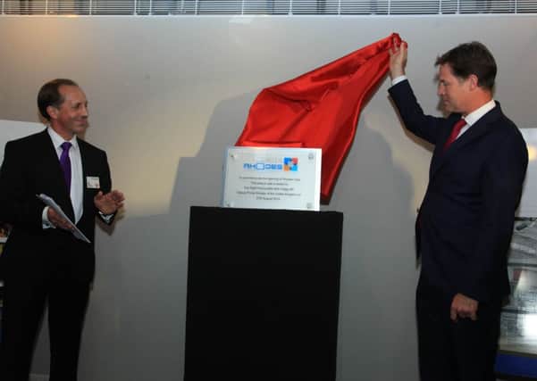 Nick Clegg unveiling a plaque at the Rhodes India Inauguration, with managing director Mark Ridgway