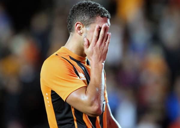 Hull City's Jake Livermore stands dejected after the UEFA Europa League defeat over two legs to Belgian side Lokeren.