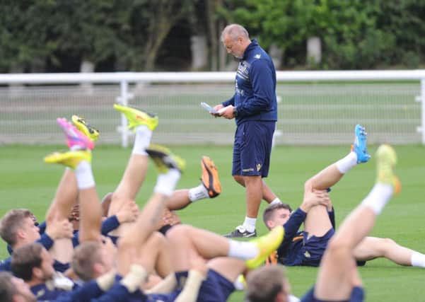 Caretaker coach Neil Redfearn takes yesterday's training sessaion at Thorp Arch. Picture: Andrew Varley.