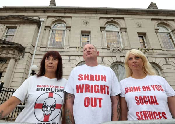 Protesters (from left) Fina Varley, Andrew Edge and Gail Speight outside Rotherham Town Hall.