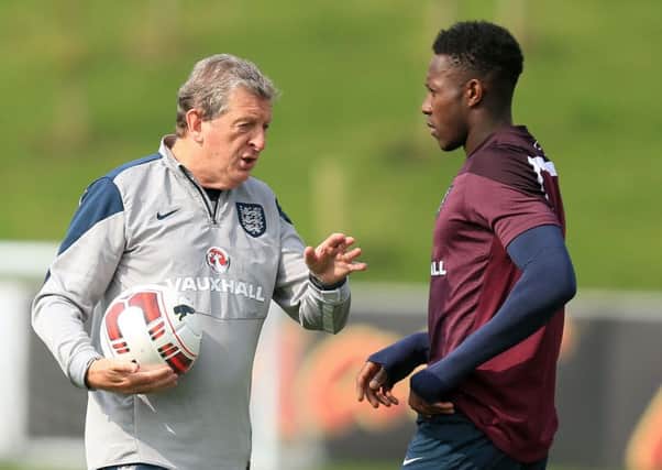 England manager Roy Hodgson gives out instructions to Danny Welbeck