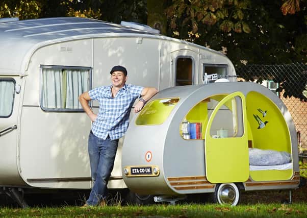 43-year-old Yannick Read from London who has earned a place in the 2015 Guinness World Records book for building the world's smallest caravan.
