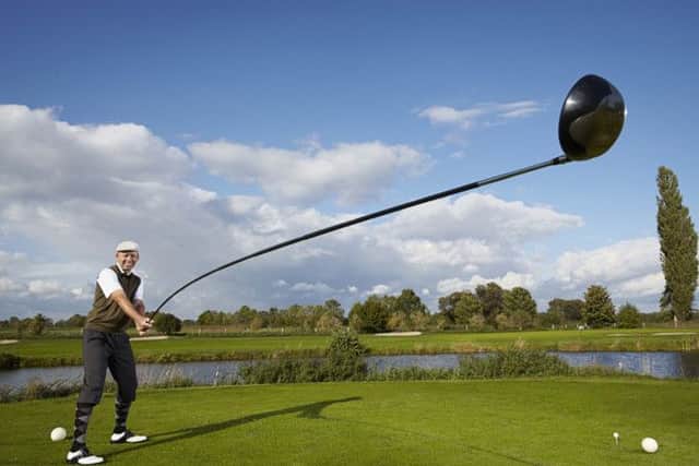 49 year-old Trick Golf Artist Karsten Maas, from Denmark who makes it into the 2015 Guinness World Records book for creating the world's longest usable golf club