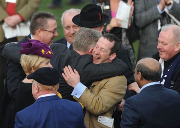 Connections of Lord Windermere including trainer Jim Culloty, centre, celebrate after winning the Cheltenham Gold Cup back in March (Picture: Joe Giddens/PA).