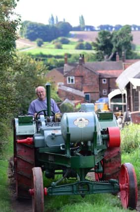 John Smith on his vintage tractor which was made in 1917.