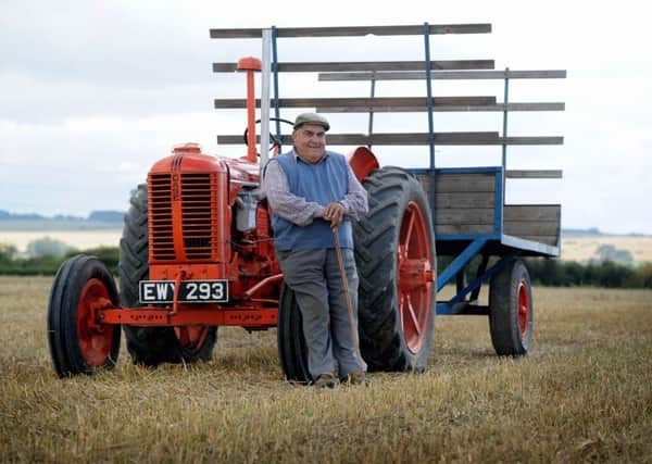 Andy Bulmer's father David with a vintage tractor.