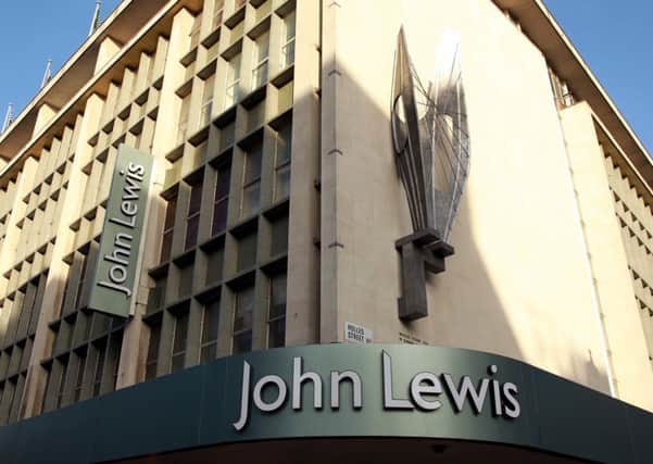 John Lewis racked up another big jump in profits as they offset a much weaker performance from Waitrose supermarkets.