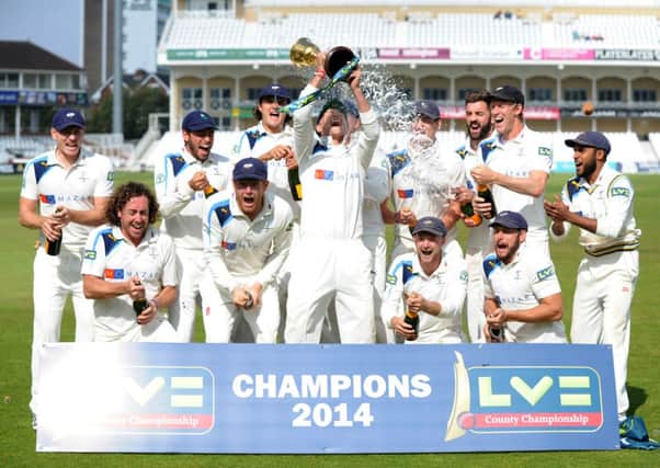 Yorkshire's players celebrate after winning the championship.
