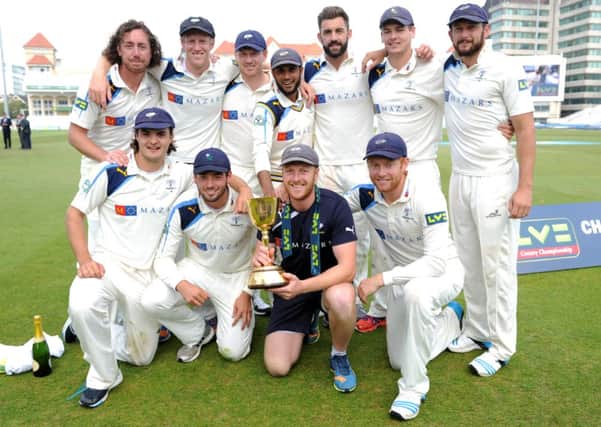 Yorkshire's players celebrate after winning the County Championship.  12th September 2014. Picture: Jonathan Gawthorpe.
