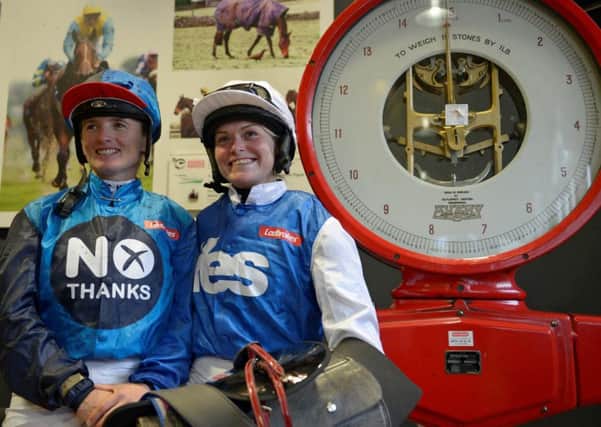 Female jockeys Rachael Grant and Carol Bartley taking part in a special Scottish Referendum race at Musselburgh racecourse