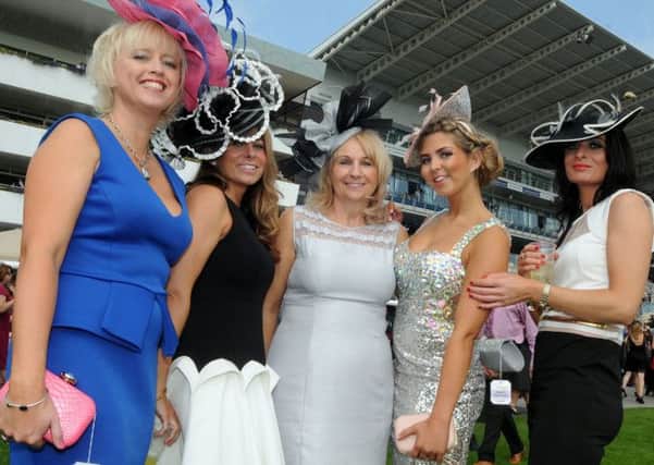 The winner of the best dressed competition, Jayne Walker-Ellis, second left, with her daughter, Georgia Walker-Ellis, second right, and friends from left, Sarah Miller, Kin Hardy and Melissa Hardy.