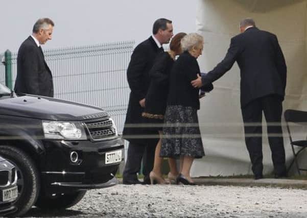 Eileen Paisley, 2nd right, and Ian Paisley jnr, left, arrive for the burial of Ian Paisley at Ballygowan Free Presbyterian church, Northern Ireland