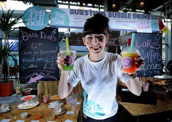 Tanja Quinn, 20, of Pop A Ball, one of the Street Food vendors within Trinity Kitchen.