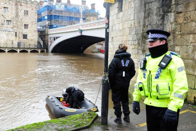 Police frogmen search the River Ouse
