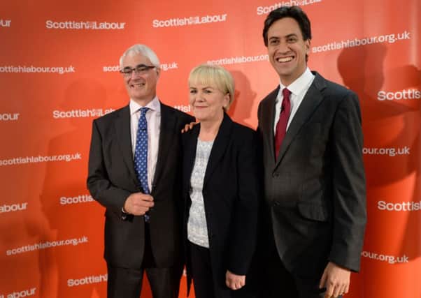 Better Together leader Alistair Darling, Scottish Labour leader Johann Lamont and Labour leader Ed Miliband at a rally in Glasgow after Scotland voted decisively to reject independence