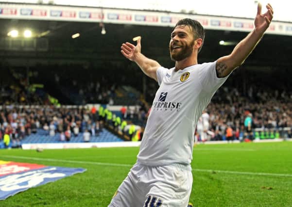 Mirco Antenucci celebrates Leeds's second goal in their 3-0 win over Huddersfield Town.