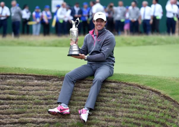Rory McIlroy with the Claret Jug after winning the 2014 Open Championship.