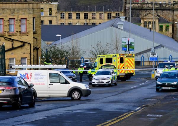 Police at the scene of the tragedy in Dewsbury