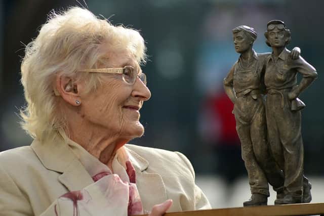 Kit Sollit, one of the last surviving members of Sheffield's ' Women of Steel' campaign with a maquette of the statue.