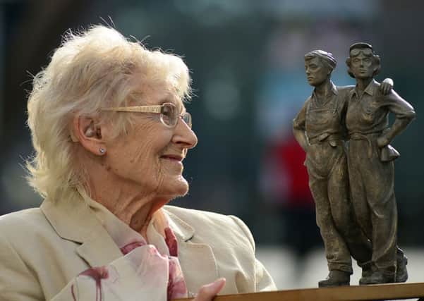 Kit Sollit, one of the last surviving members of Sheffield's ' Women of Steel' campaign with a maquette of the statue.