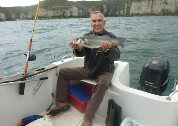 Stewart Calligan with the sea bass catch on his latest fishing trip.