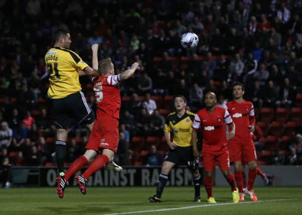 Michael Higdon leaps to score Sheffield United's winning goal at Leyton Orient. Picture: Martyn Harrison.