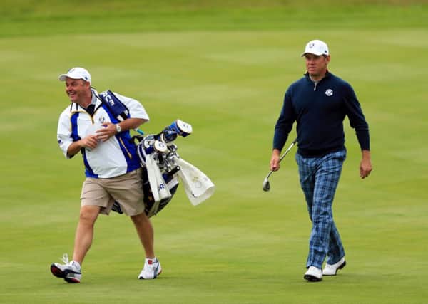 Europe's Lee Westwood (right) and his caddy Billy Foster during a practice session at Gleneagles