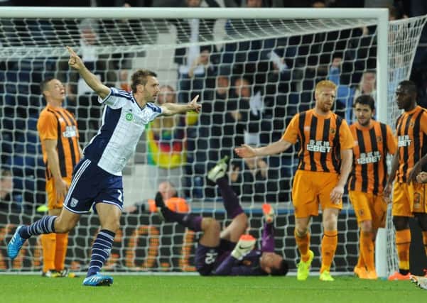 West Brom's Gareth McAuley celebrates after scoring his sides second goal against Hull City.