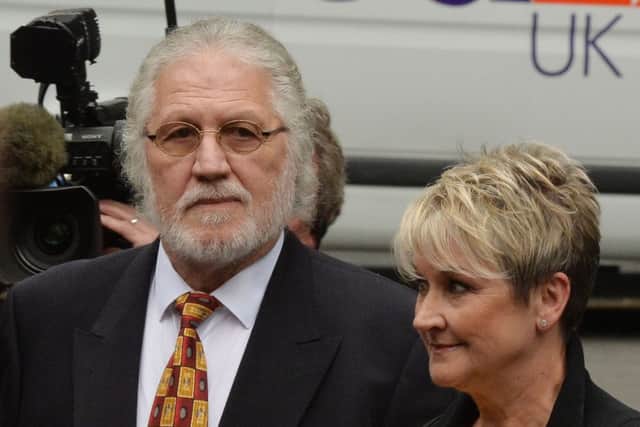 Former Radio 1 DJ Dave Lee Travis arrives at Southwark Crown Court with his wife Marianne
