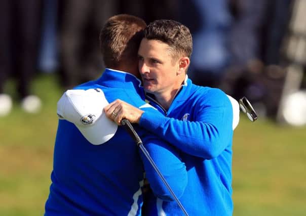 Europe's Justin Rose (right) and Henrik Stenson celebrate beating USA's Bubba Watson and Webb Simpson during the Fourball matches on day one of the 40th Ryder Cup at Gleneagles Golf Course, Perthshire.
