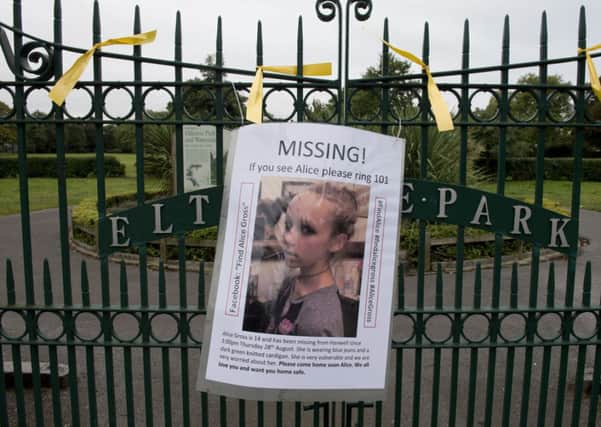 A sign for missing teenager Alice Gross tied to the railings of Elthorne Park, Boston Manor in west London