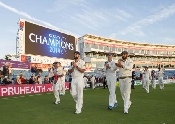 Yorkshire's players parade round the pitch at Headingley with the LV County Championship trophy.