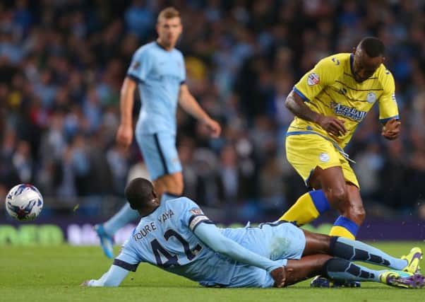 Sheffield Wednesday's Kamil Zayatte challenges Manchester City's Yaya Toure during Wednesday night's 7-0 defeat.