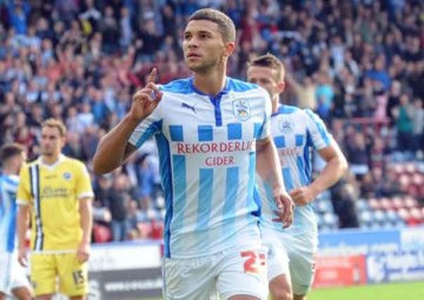 Huddersfield Town's Nahki Wells celebrates after scoring the winning goal
