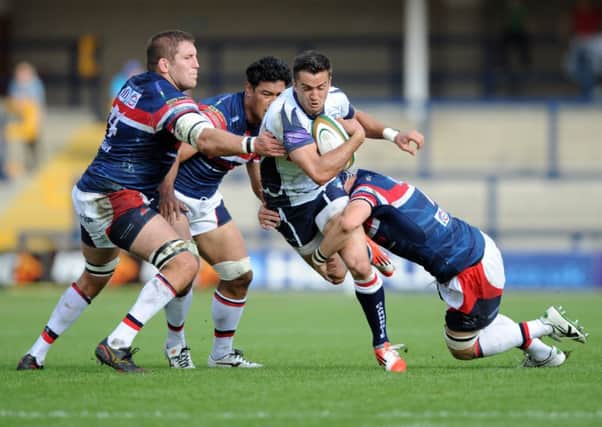 NO WAY THROUGH: Yorkshire Carnegie's David McIlwaine is stopped by Doncaster's robust defence. Picture: Steve Riding.