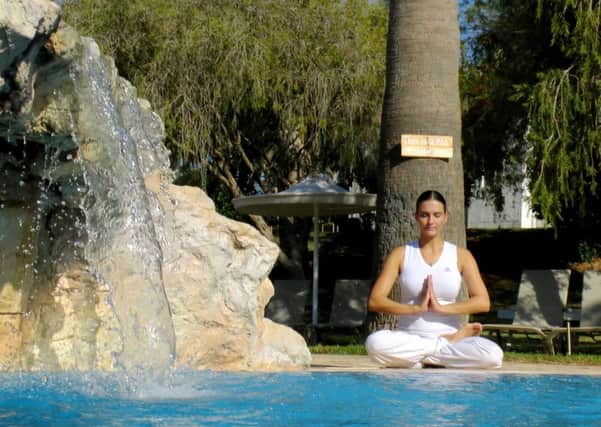 Yoga practice at Fonatan Pool at Zening Resort in Latchi, Cyprus.