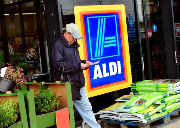 Aldi plans to open up to 65 new stores next year as it continues to step up the pressure on the Big Four grocery chains.