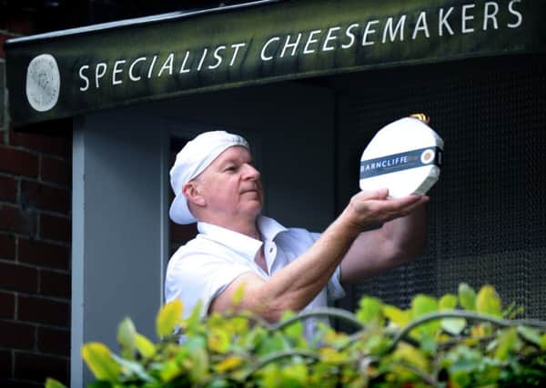 Danny Lockwood from Yorkshire Fine Cheese in Shelley, Huddersfield, with his Barncliffe Brie. Pictures by Jonathan Gawthorpe