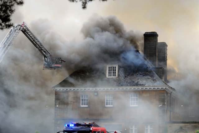 Firefighters tackle the blaze at Crathorne Hall, Yarm. Pictures by Simon Hulme