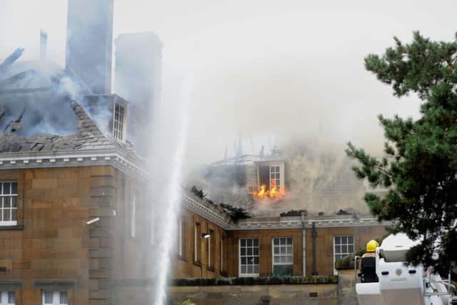 Firefighters tackle the blaze at Crathorne Hall, Yarm. Pictures by Simon Hulme