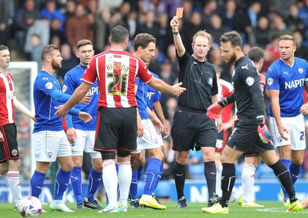 Sheffield United's Michael Higdon is given a red card