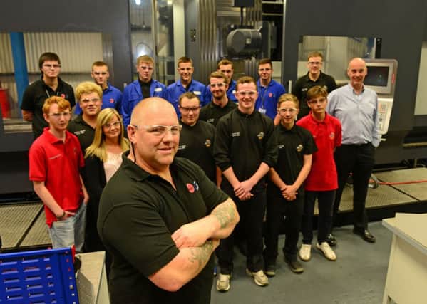 Denis Smith and apprentices with MD Clive Porter at Darron-SBO in Rotherham.